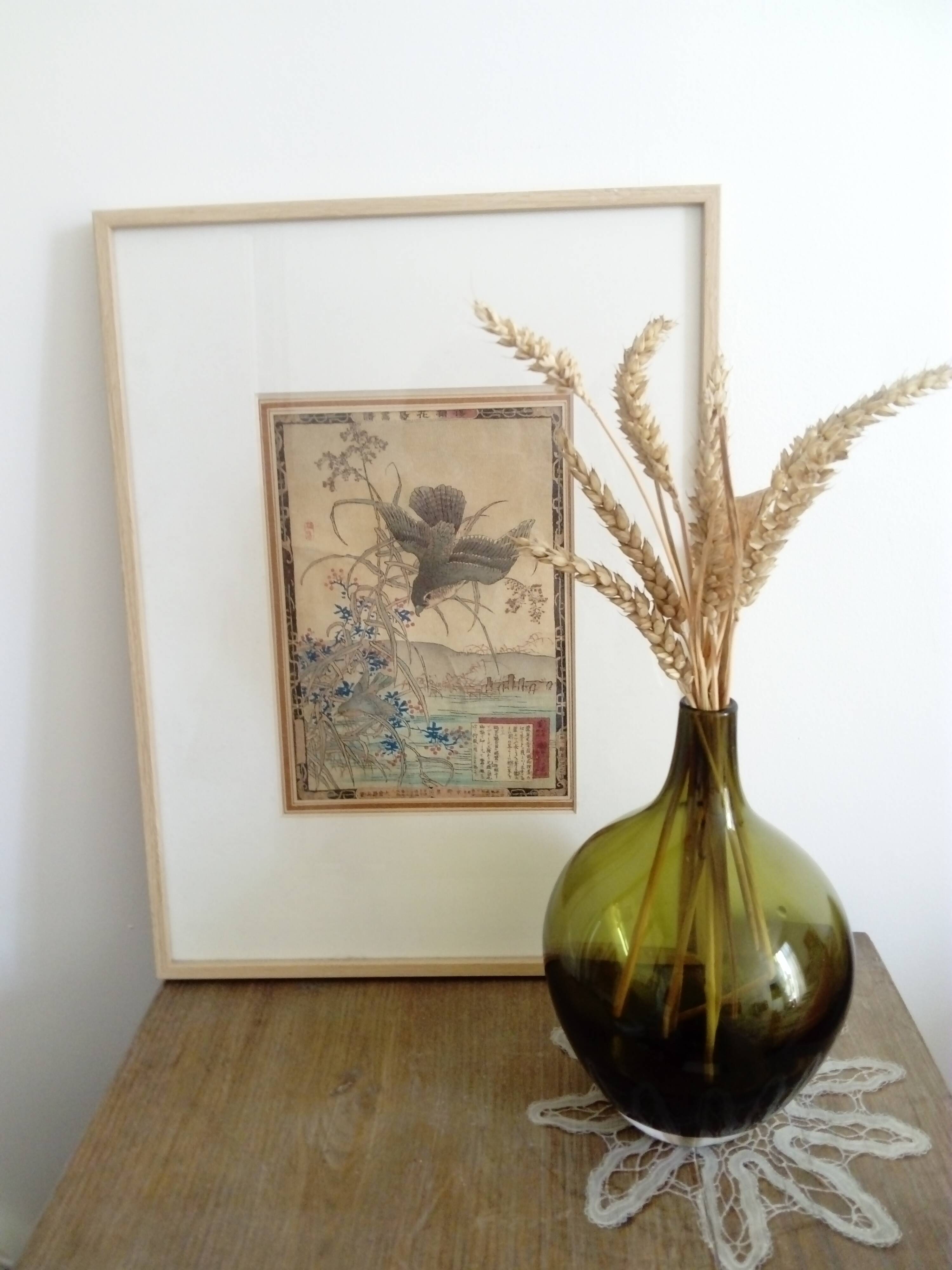 dark green drop-shaped glass vase