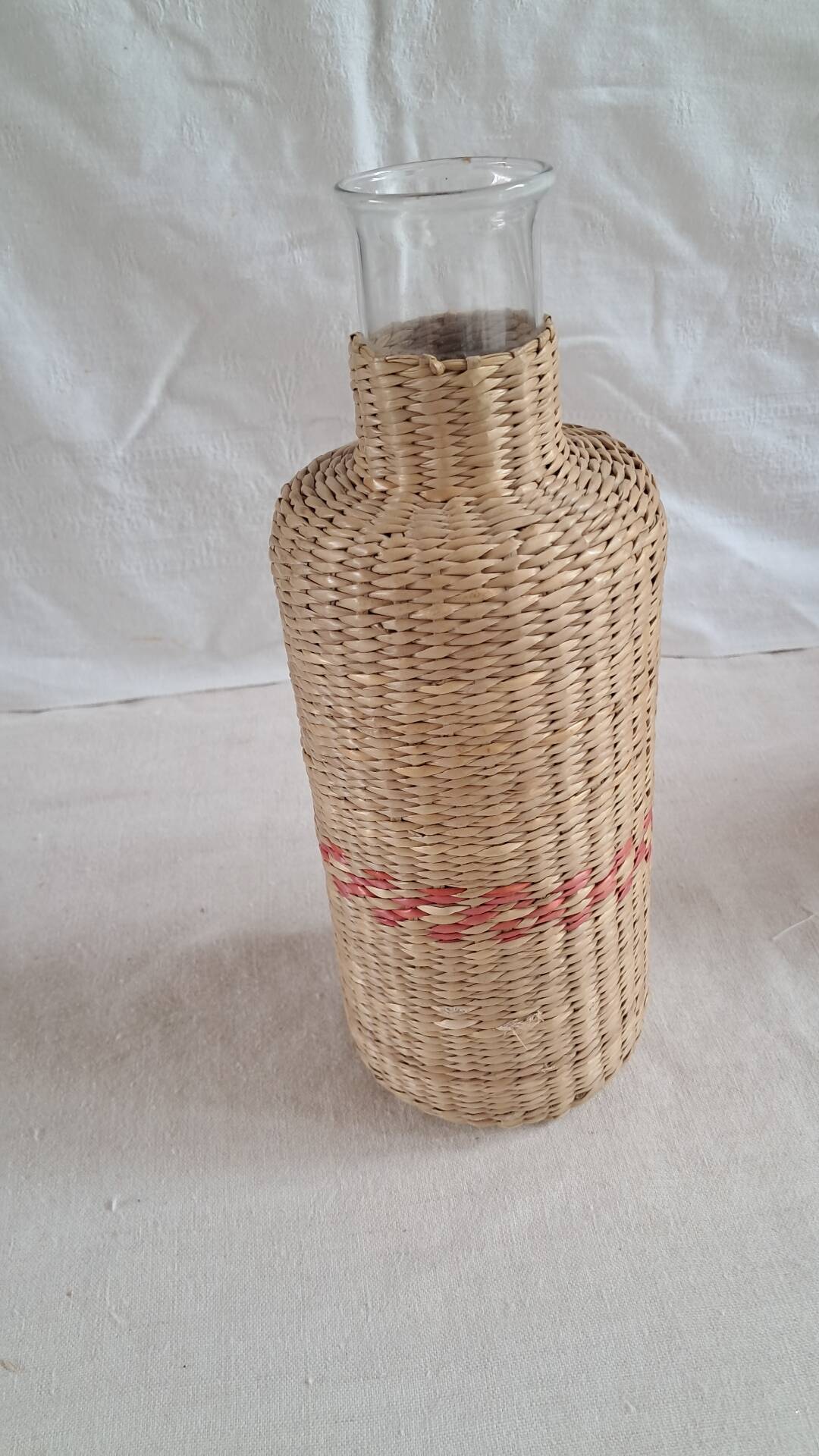 Pair of glass carafes / vases dressed in vintage woven rattan – A