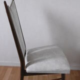 Chair in white leatherette of 60-70 years
