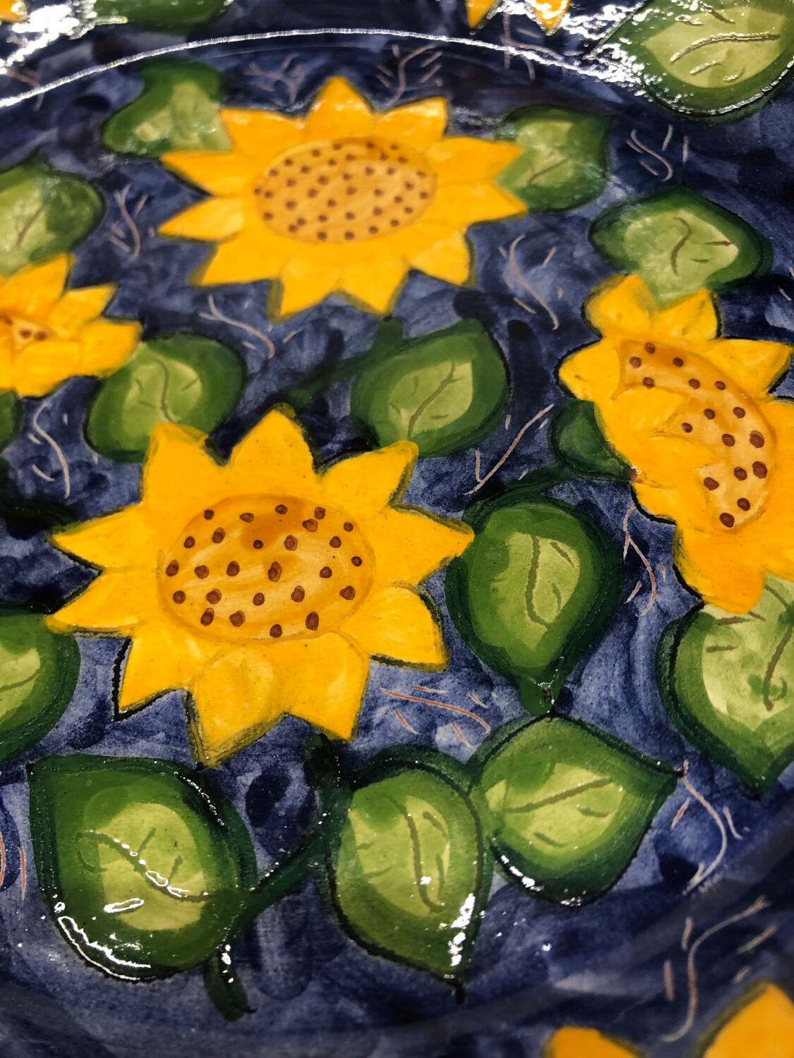 Portuguese ceramic dish decorated with sunflowers