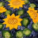 Portuguese ceramic dish decorated with sunflowers