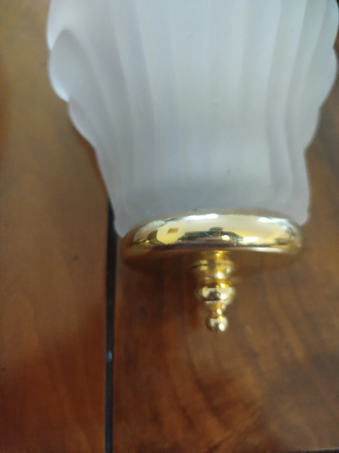 Pair of Art Deco shell wall sconces in frosted glass and brass.
