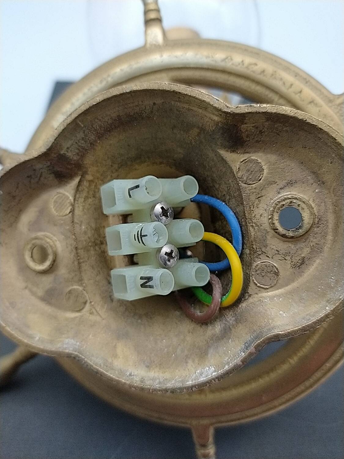 Brass wall sconces with nautical decor