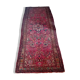 Vintage oriental rug from the 1930s. Handcrafted, handmade. Worn.