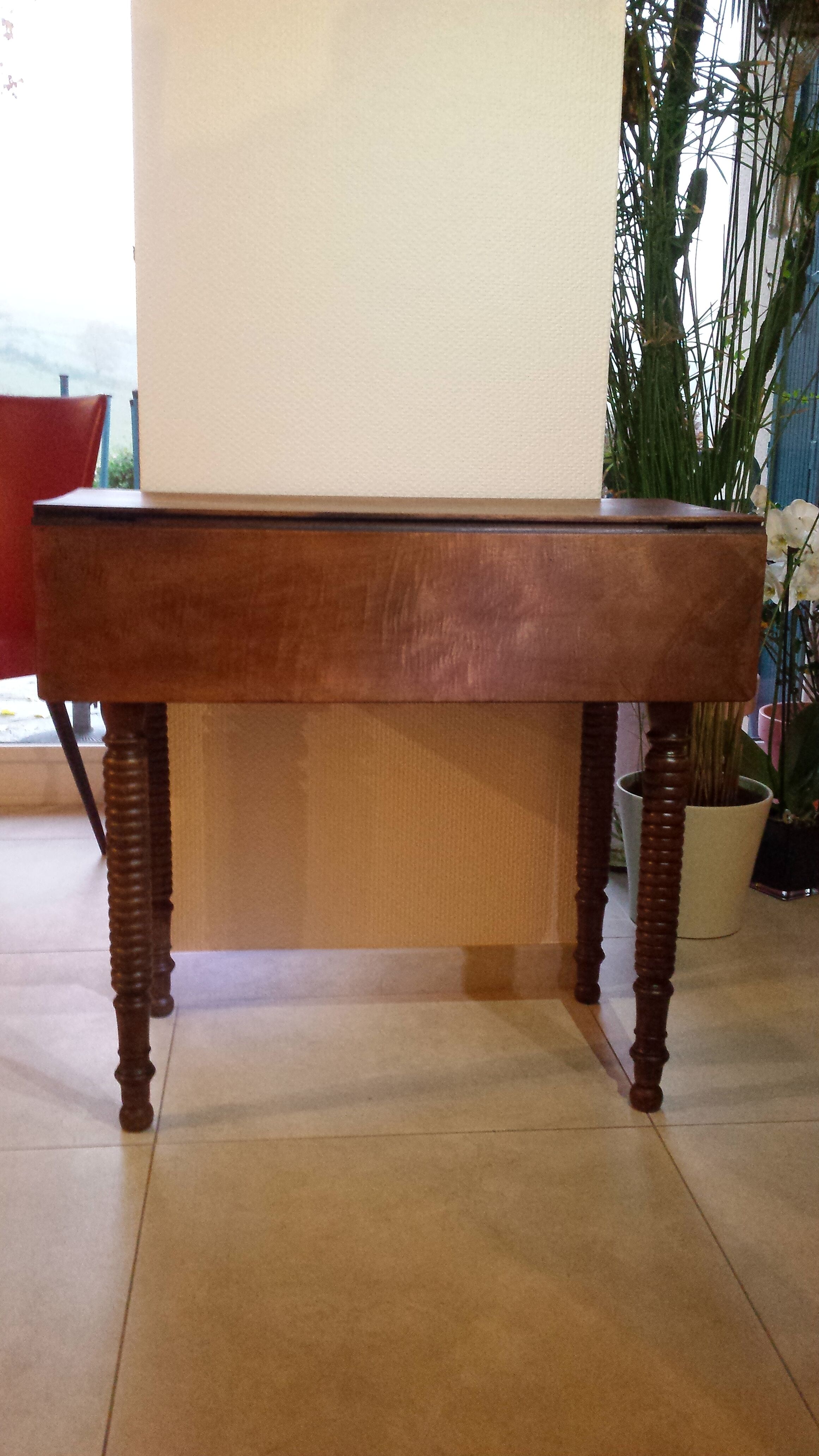 Wooden table with extensions