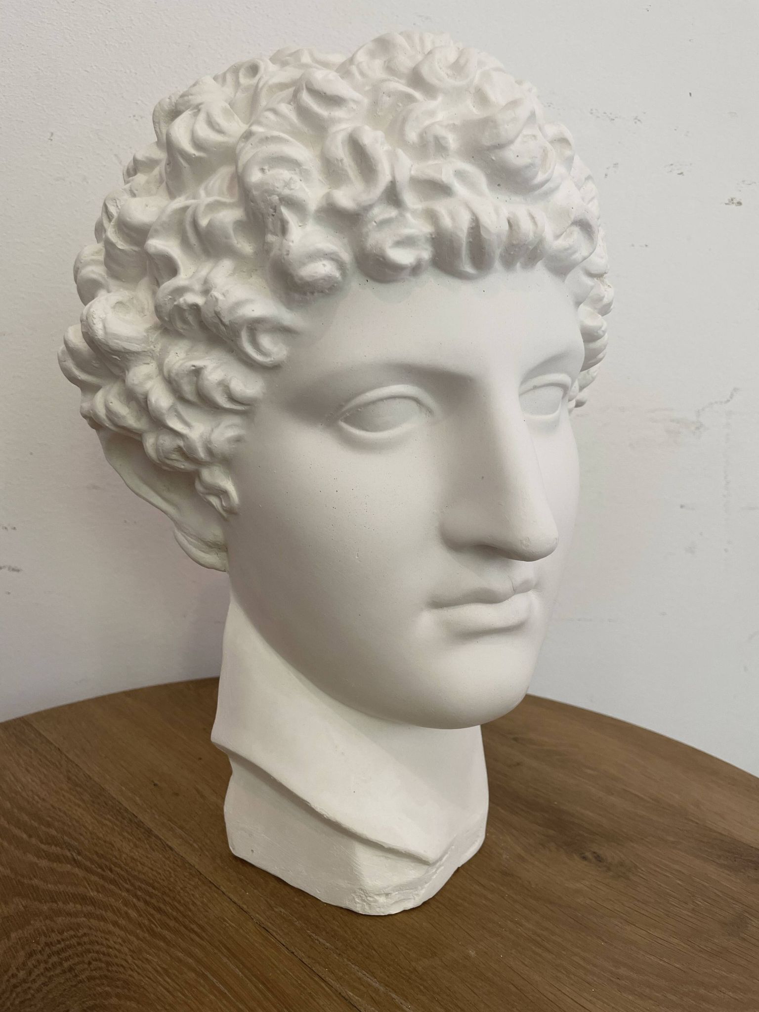 White plaster Greek head