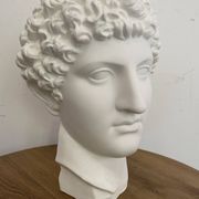 White plaster Greek head