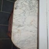 curved mahogany chest of drawers with marble top