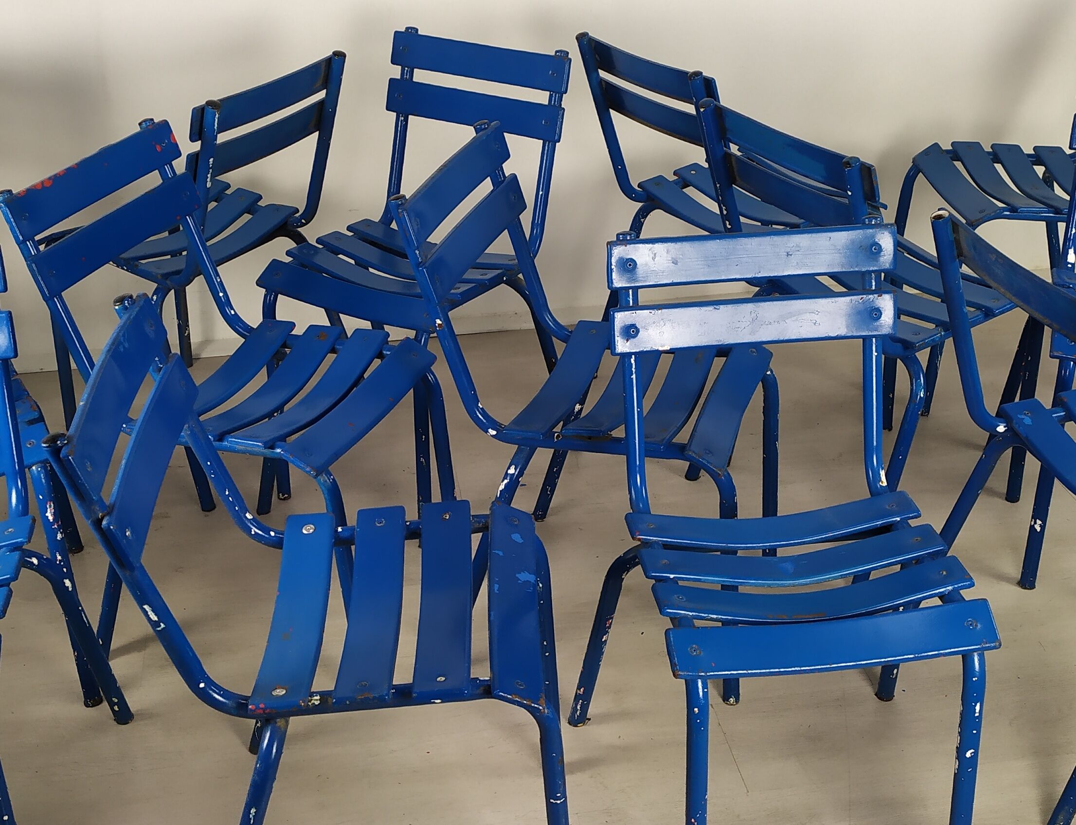 14 blue metal bistro chairs