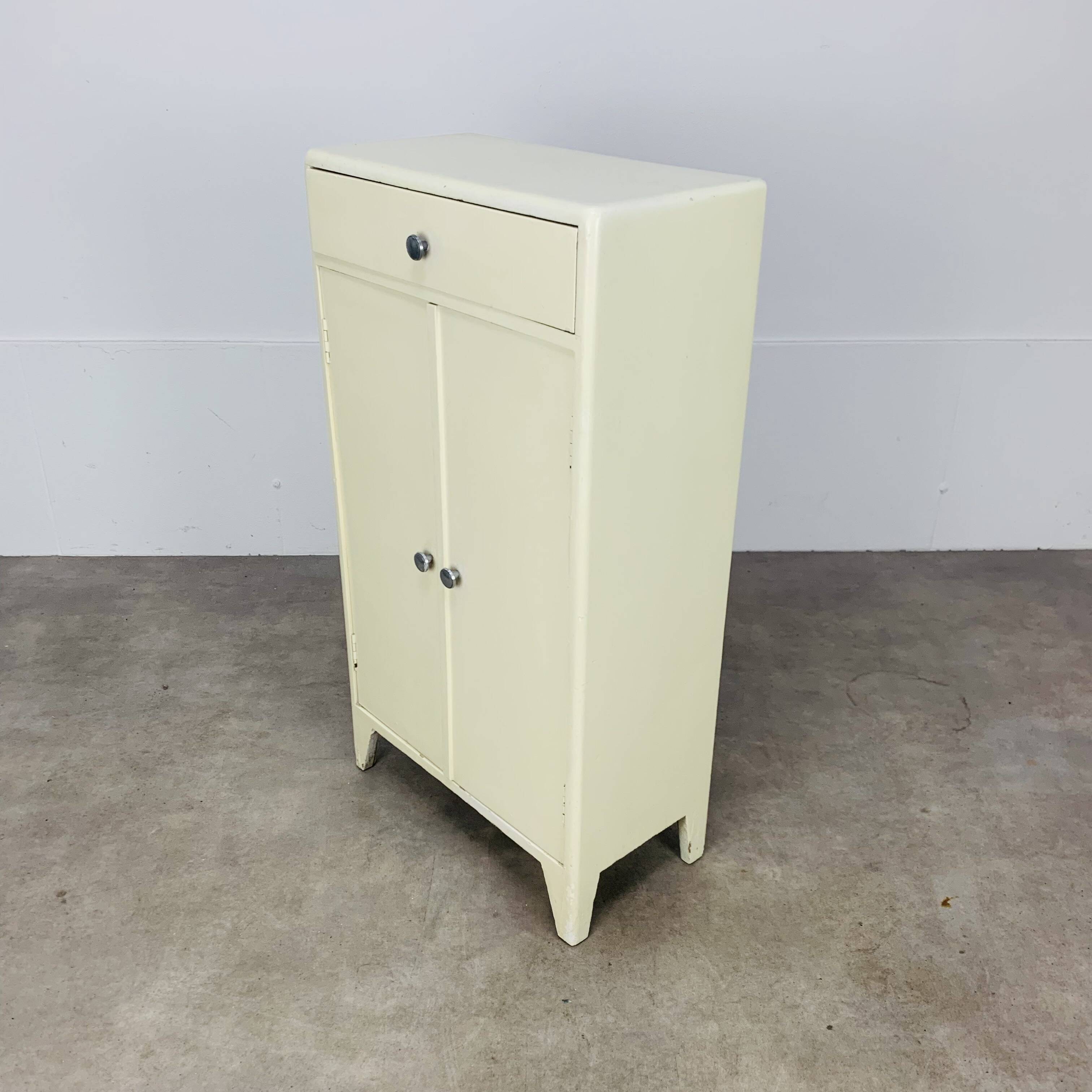 White wood convenient storage unit from the 1950s