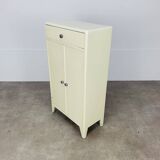 White wood convenient storage unit from the 1950s