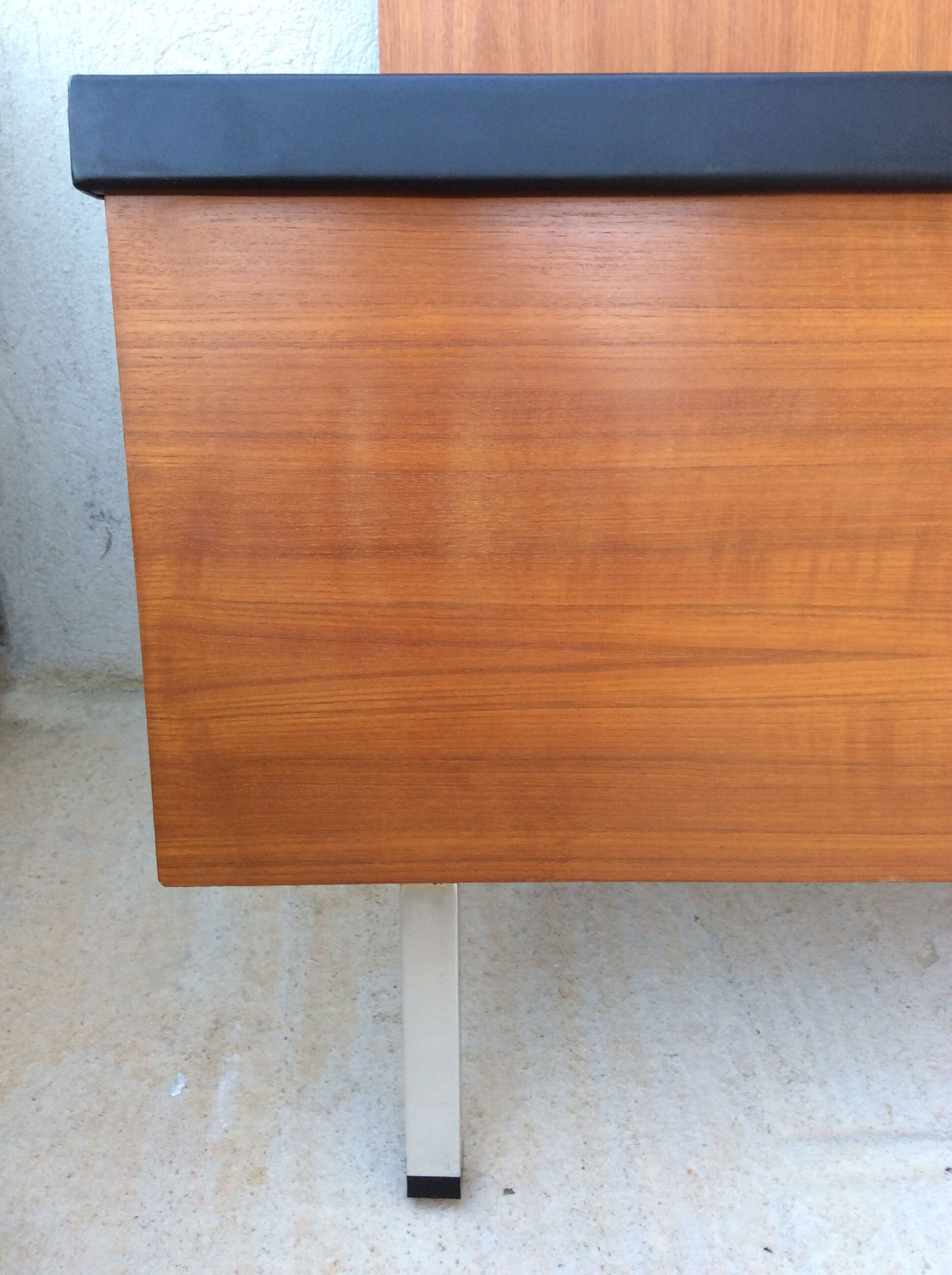 Scandinavian-style teak bed with integrated nightstands