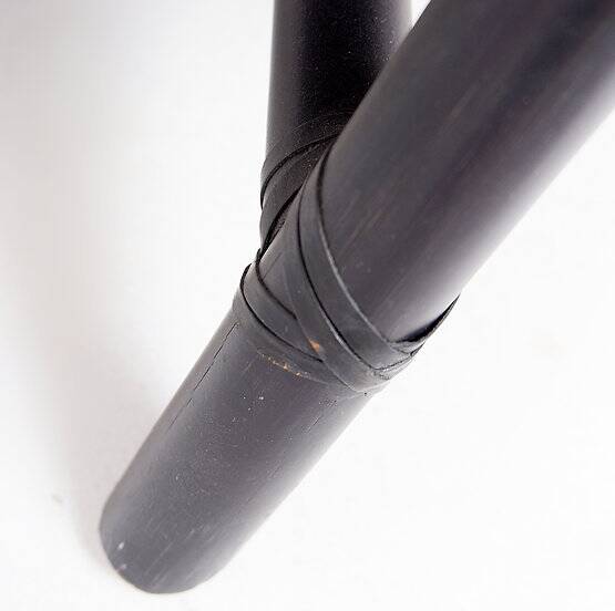 Pair of black woven leather lounge chairs