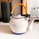 Teapot in sandstone and rose handle