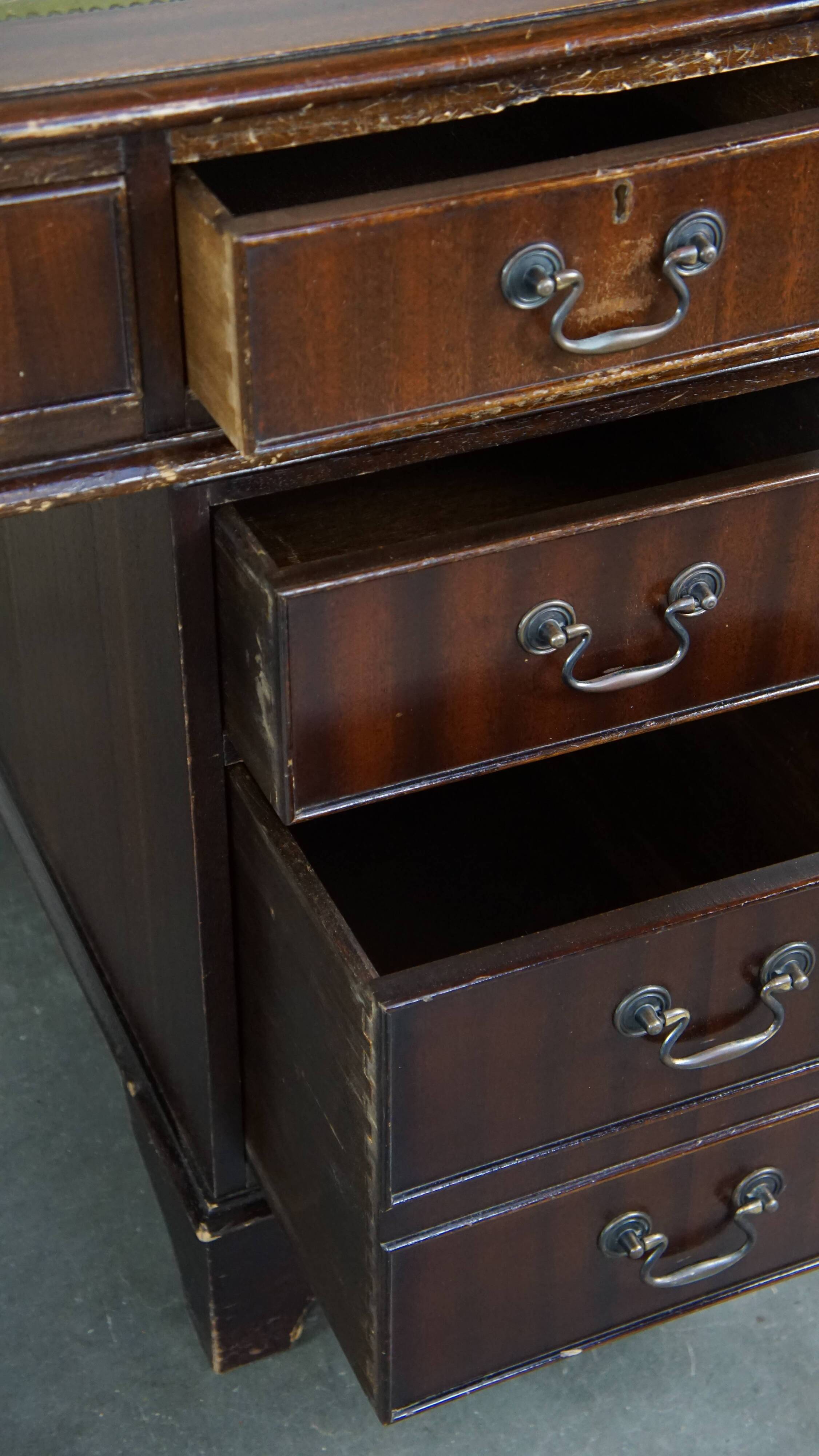 English style chesterfield desk with patina and a green leather top