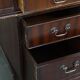 English style chesterfield desk with patina and a green leather top