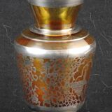 Old small glass vase decorated with silver