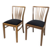 Lot de 2 chaises vintage Mid-Century dossier à barreaux bois massif design