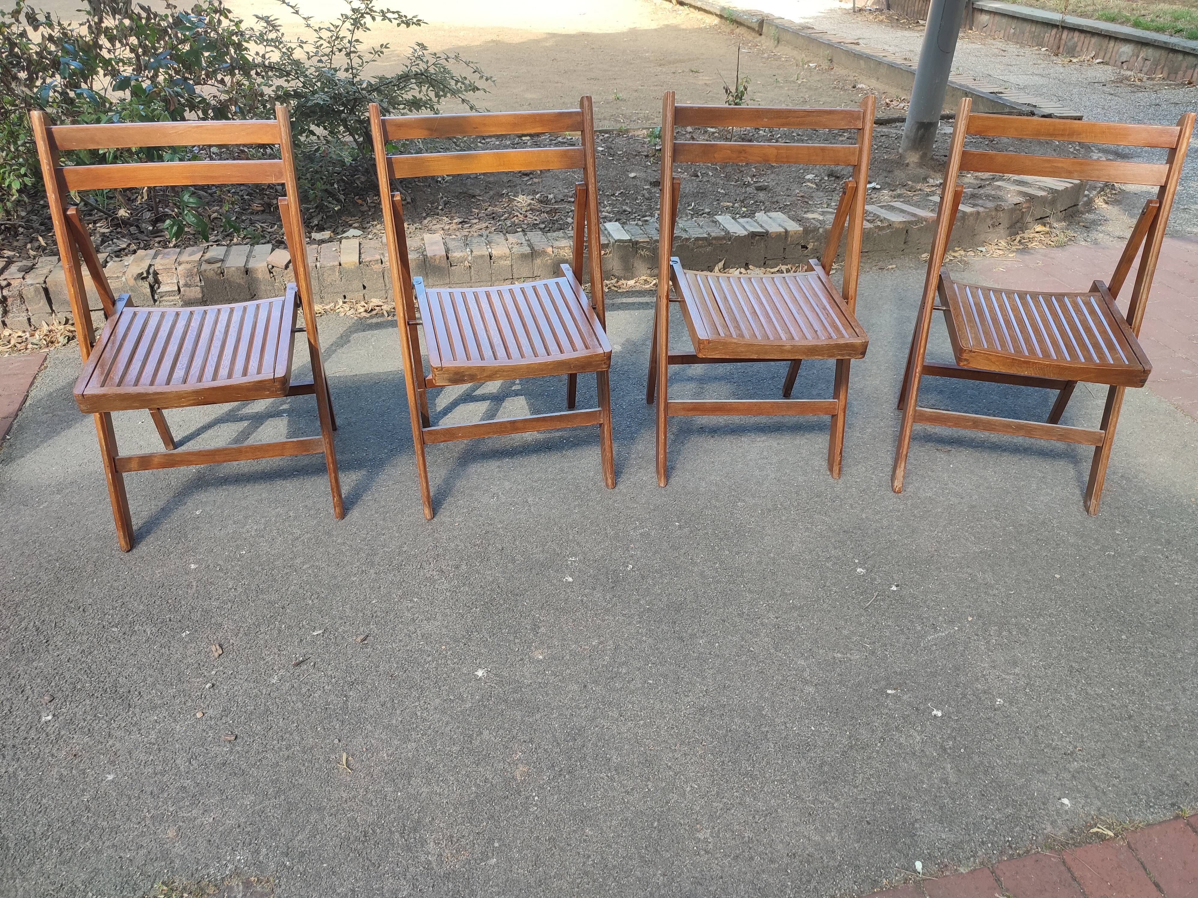 4 folding teak chairs