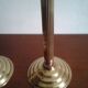 Pair of b-shaped brass legs in the shape of a column