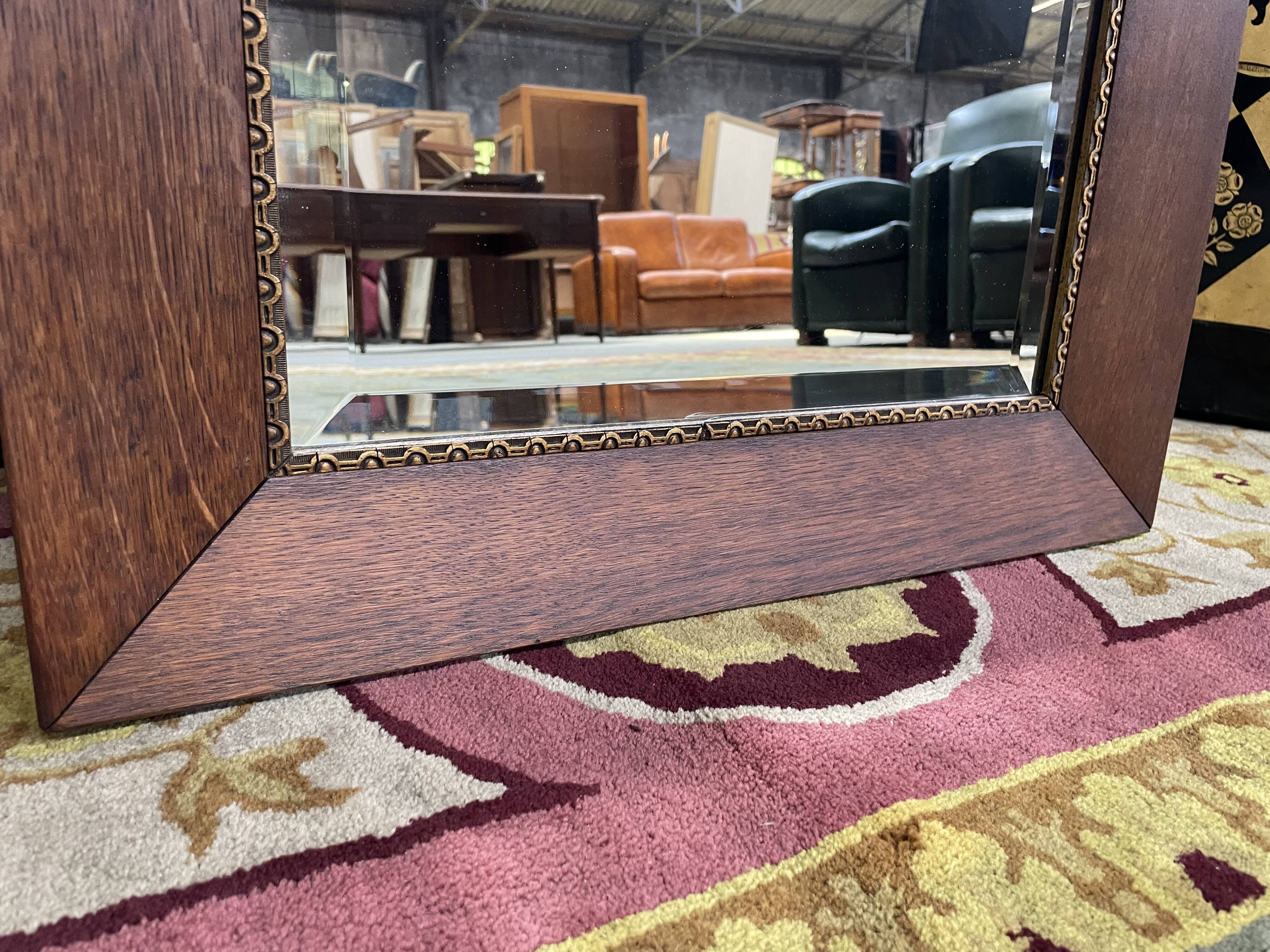 Oak mirror and old golden border