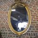 Oval mirror in Louis XV style, large model.