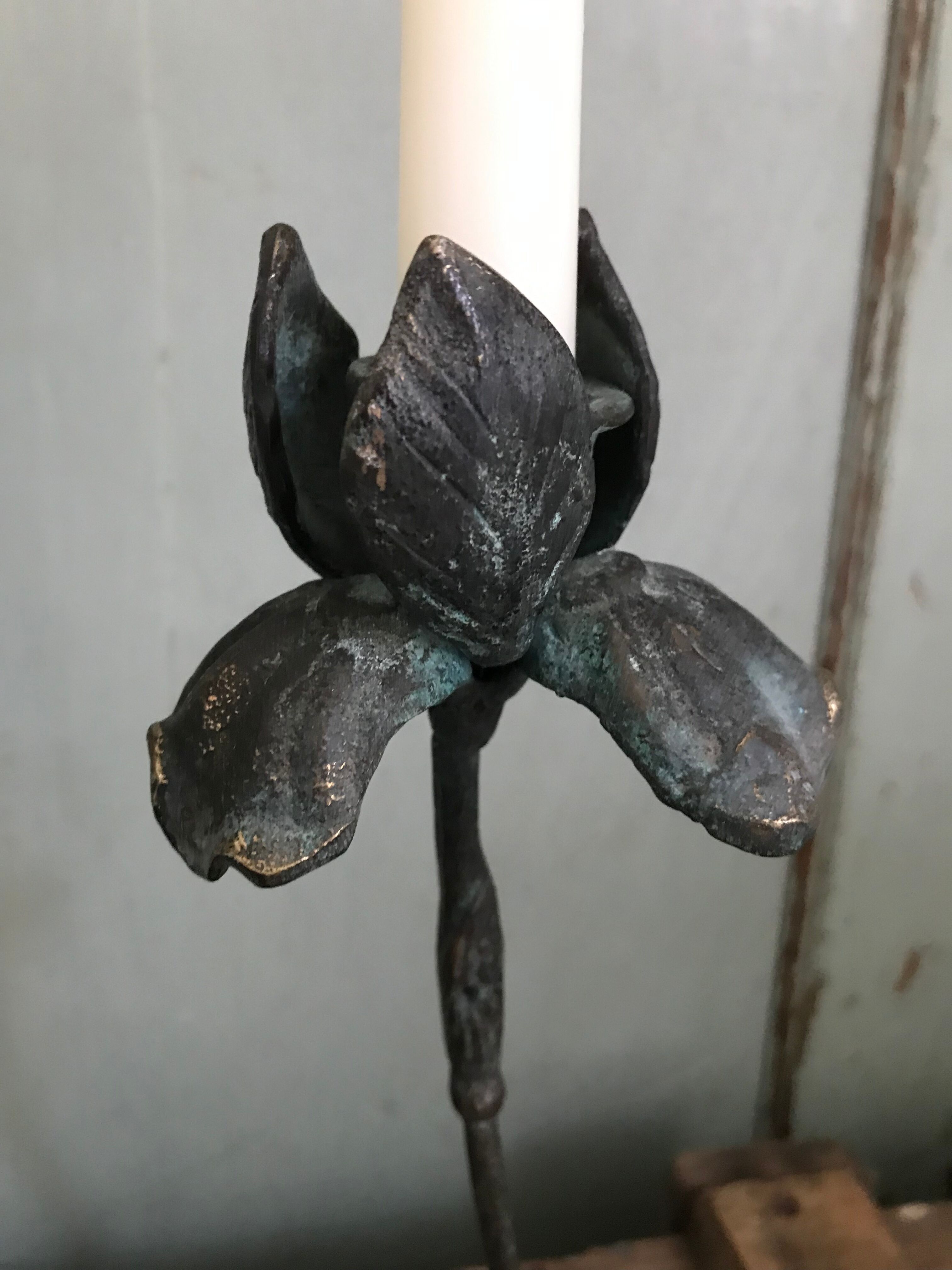 Pair of Iris candlesticks.