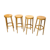 Lot de 4 tabourets de bar Baumann modèle "895 Bois" estampillés 1990 hauteur 79cm
