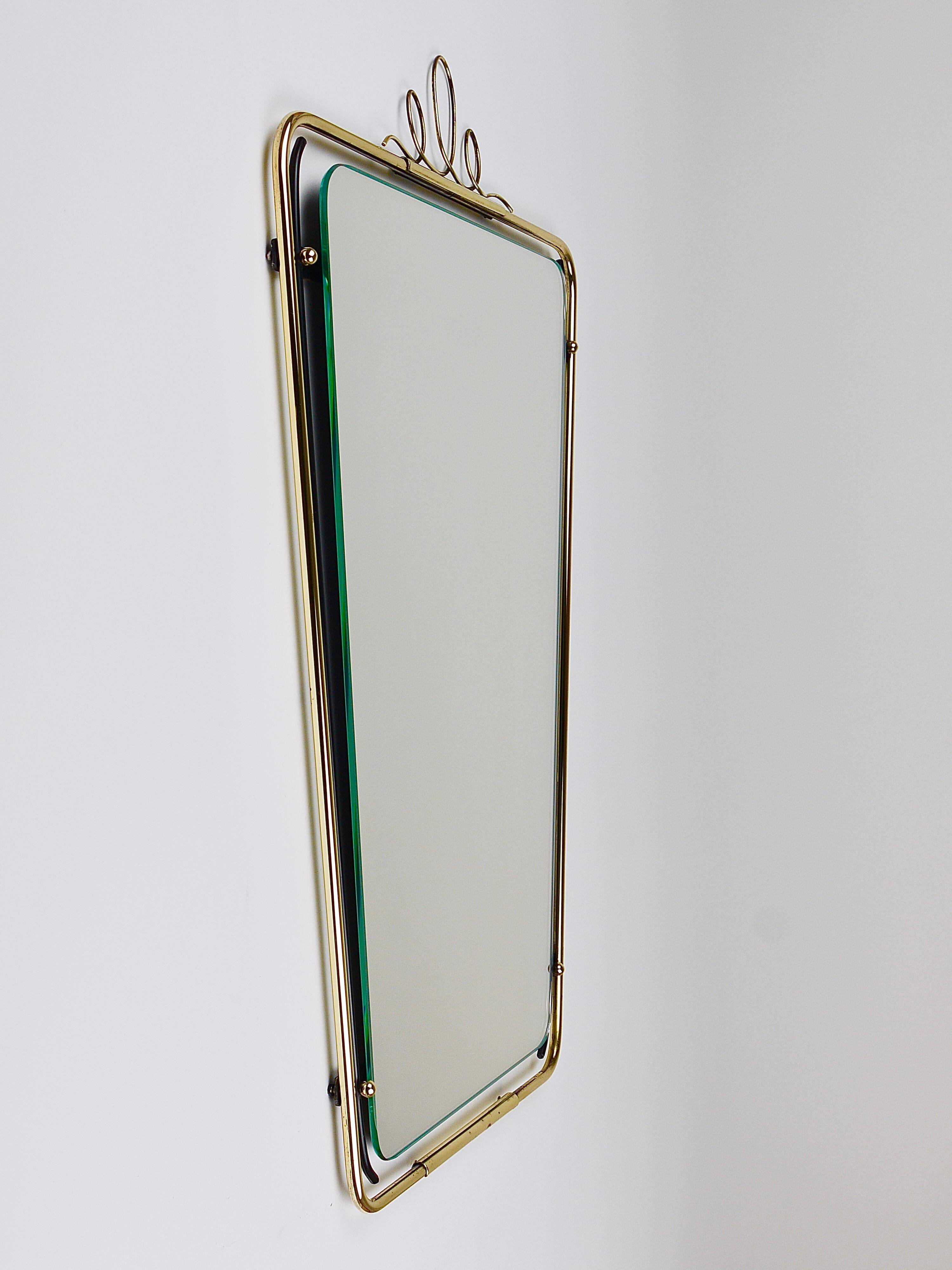 Wall mirror in brass wire with modernist loops from the mid-century, Italy, 1950s.
