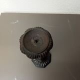 Old cast iron candle holder