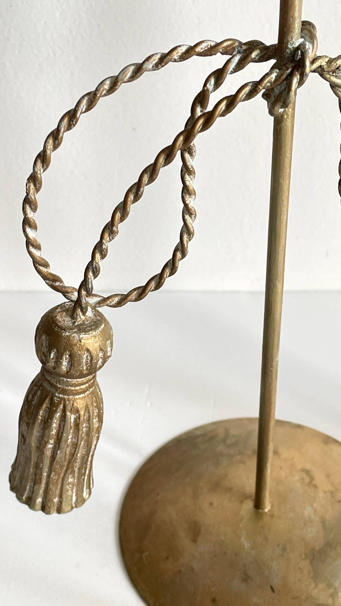Trio of vintage knotted candlesticks brass