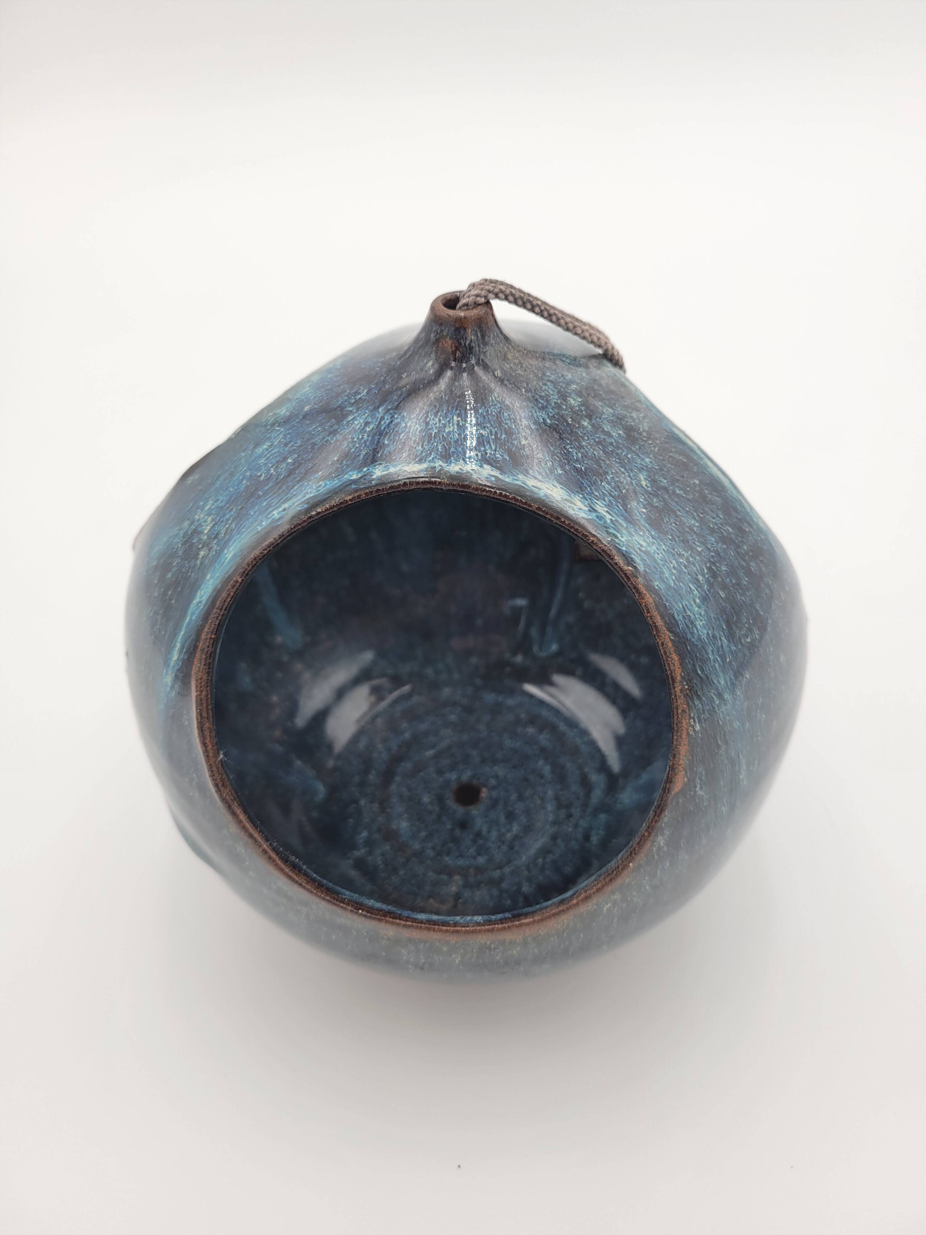 Designer bird feeder / plant stand