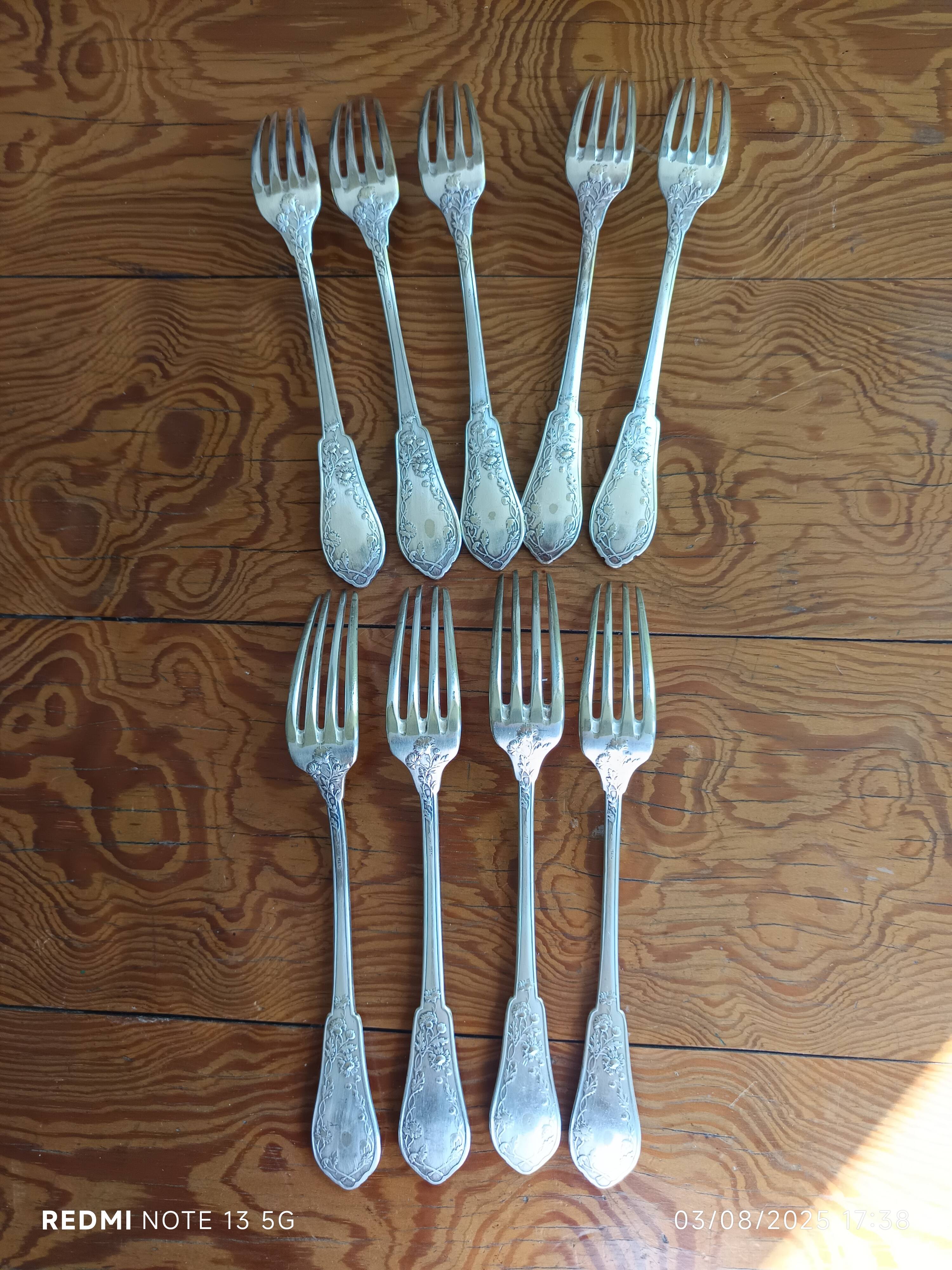 9 silver-plated Art Nouveau forks 1900-1920 with daisy decoration