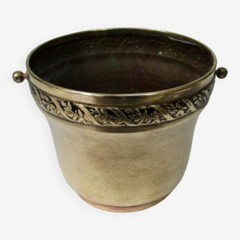 Old brass pot cover