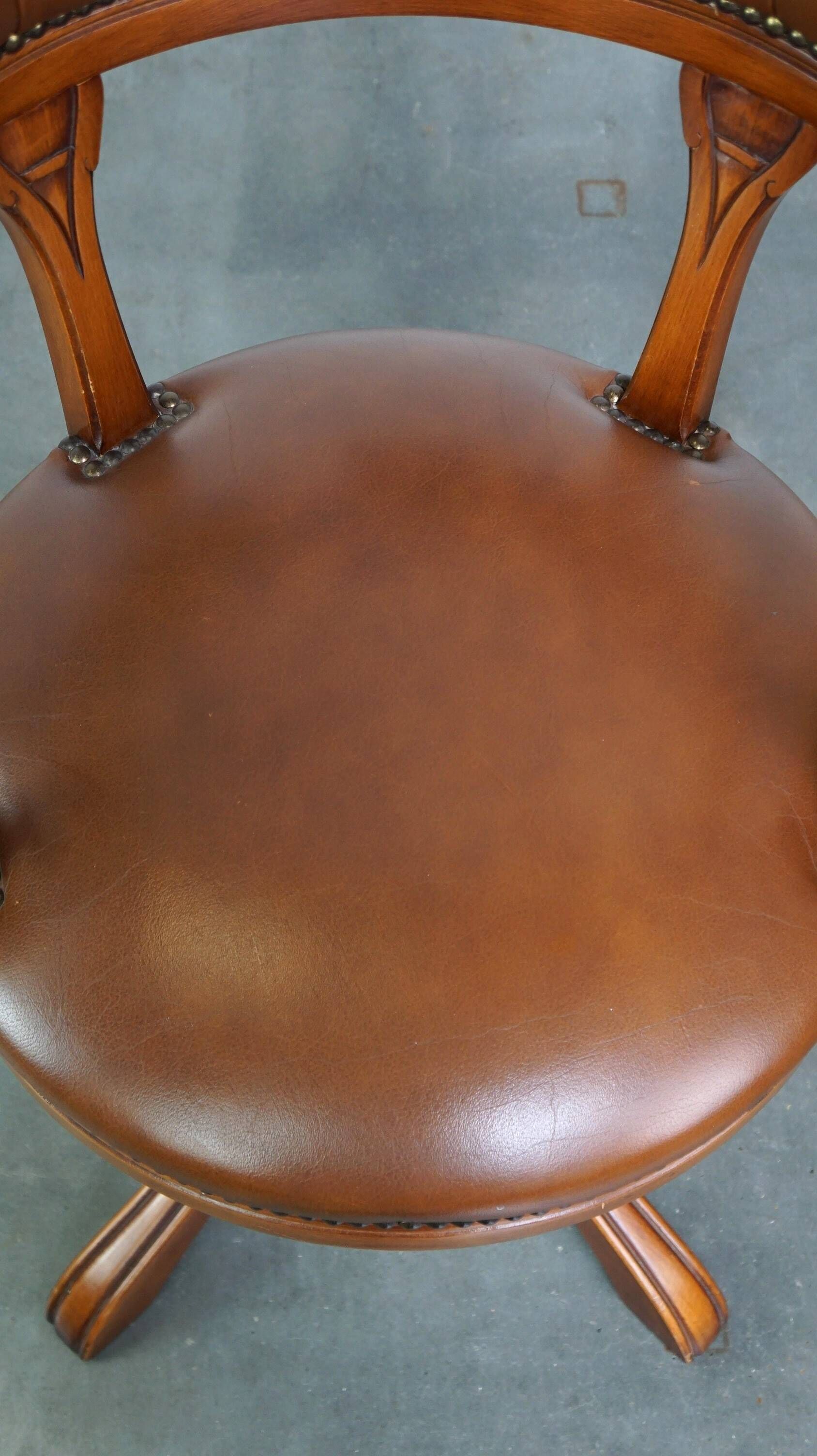 Swivel English style Chesterfield armchair/office chair in brown cowhide