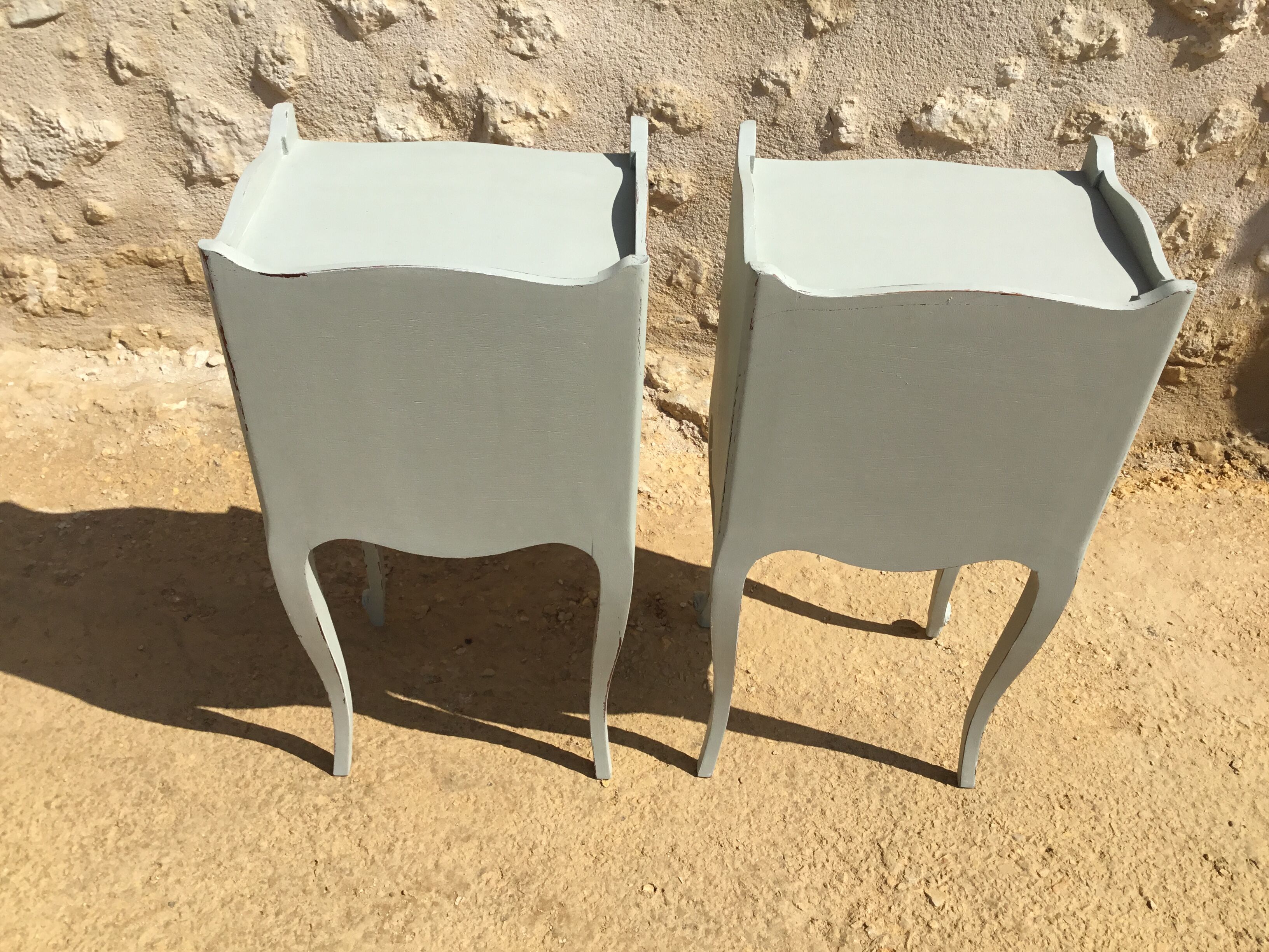 Pair of patinated Louis XV style bedside tables