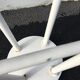 Tabouret scandinave en bois teinté blanc 60
