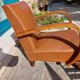 Low armchair, brown imitation leather