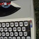Baby hermes typewriter with manual job and his bag