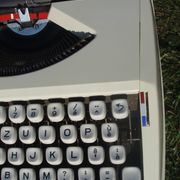 Baby hermes typewriter with manual job and his bag