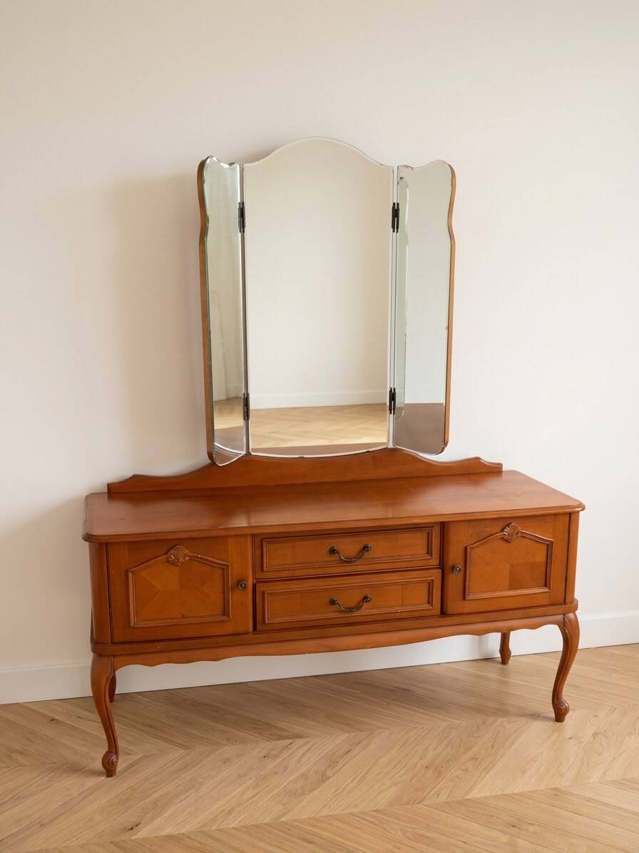 Antique wooden dressing table with a triptych mirror.