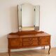 Antique wooden dressing table with a triptych mirror.