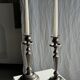 Two large antique silver-plated metal candlesticks, H30