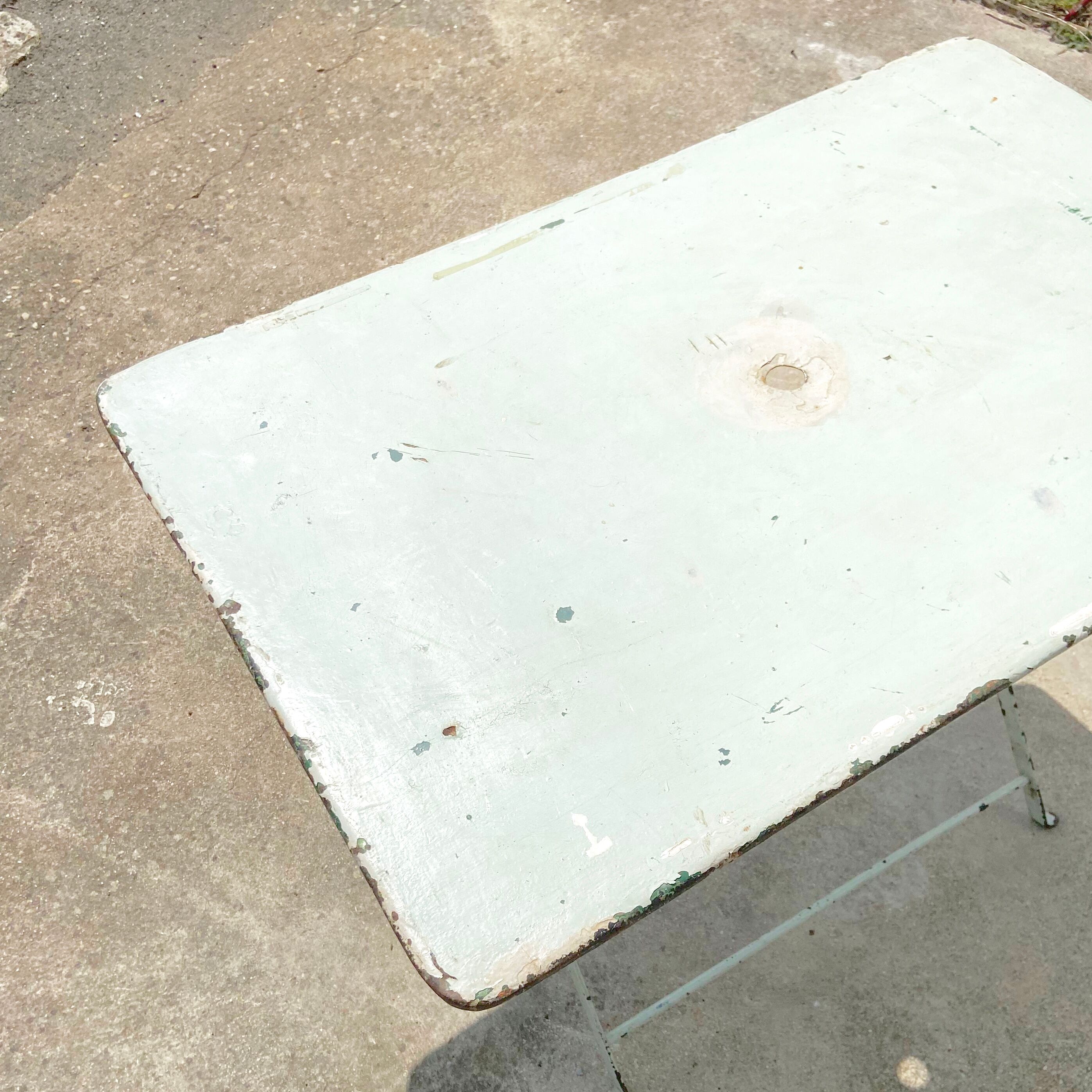 Old folding rectangular garden table - location for parassol