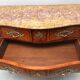 Commode de style Louis XV en placage d'acajou et bois de rose XX siècle