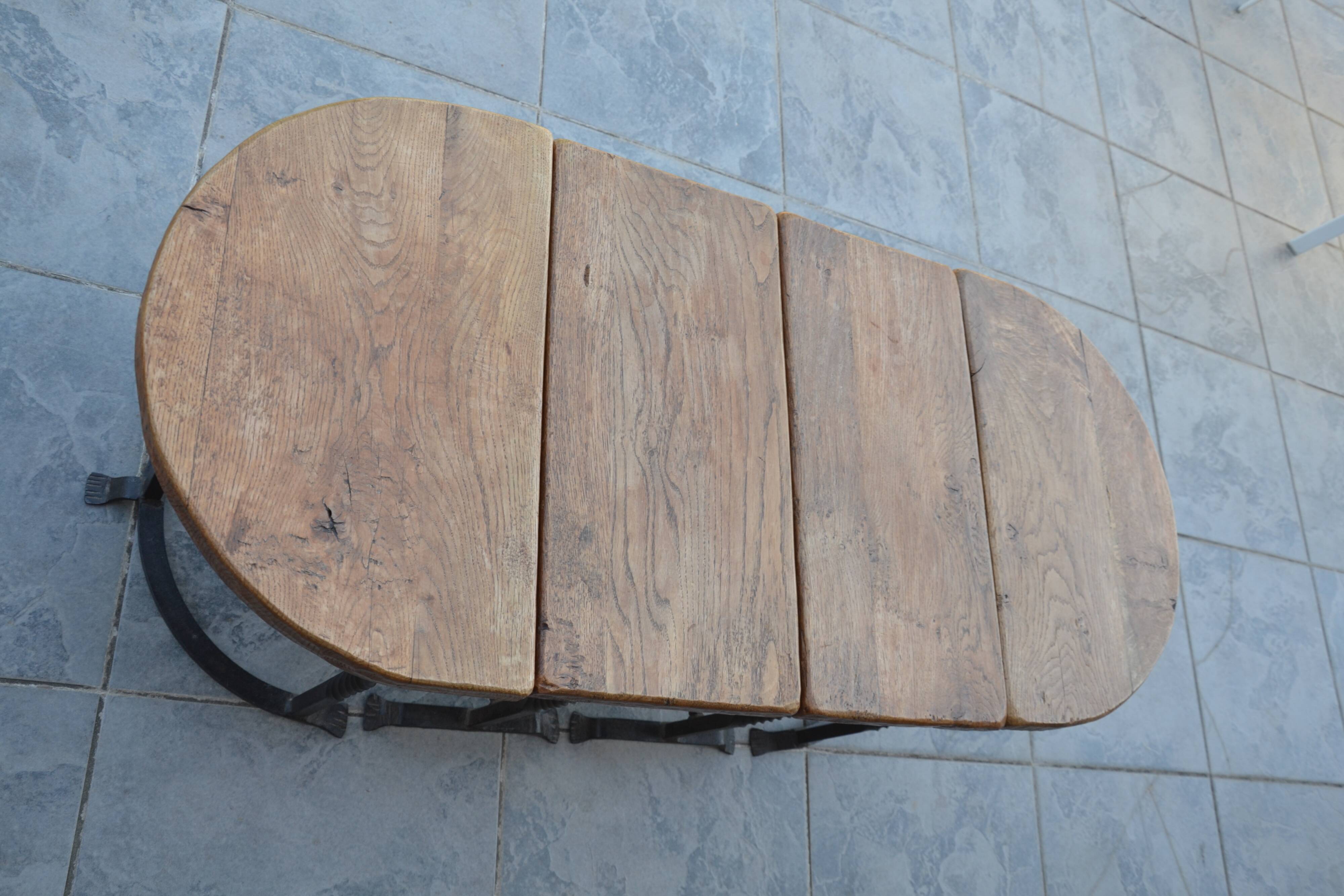Unusual modular coffee table in oak and wrought iron.
