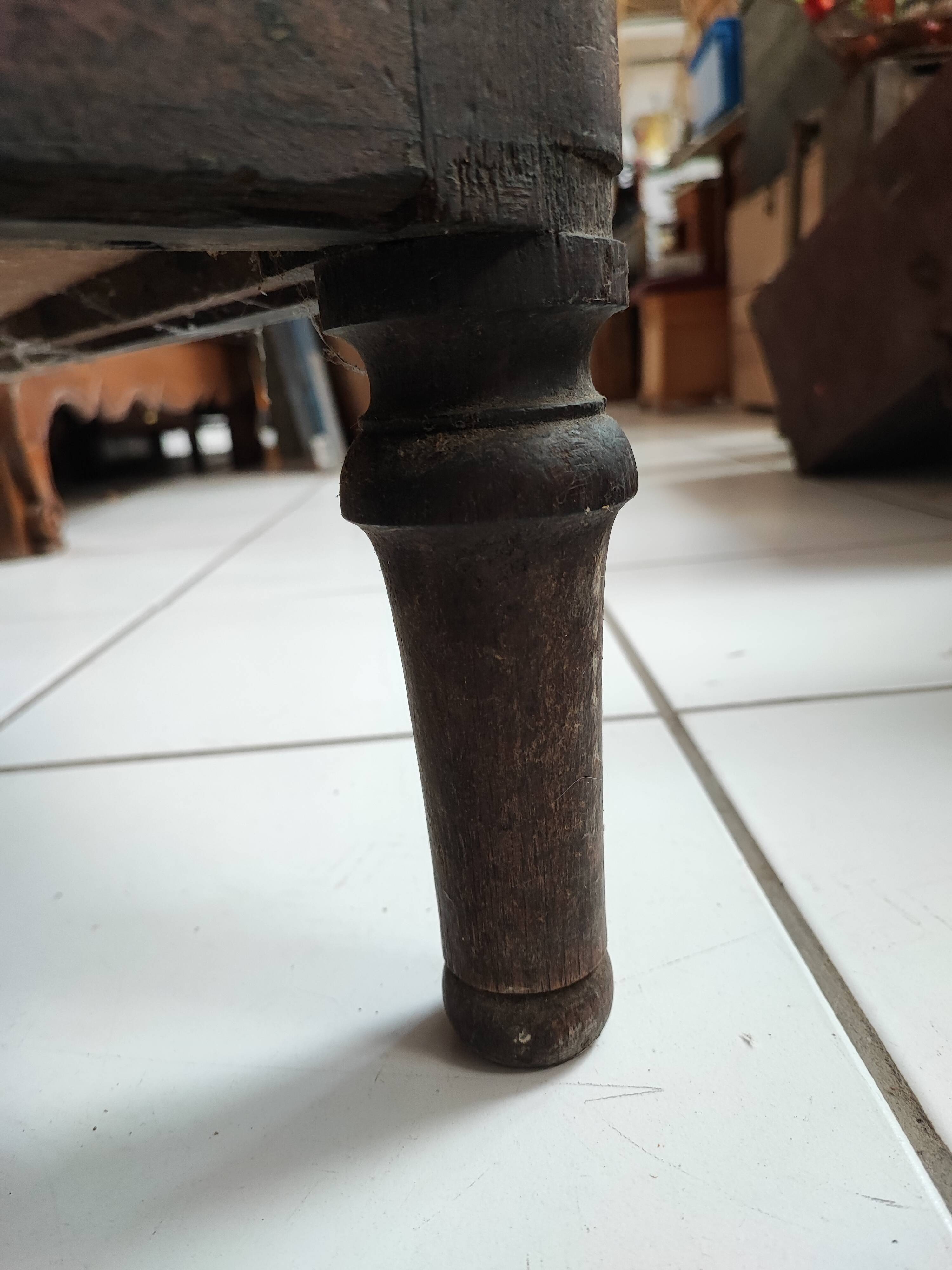 Bonnetière man standing cabinet a door