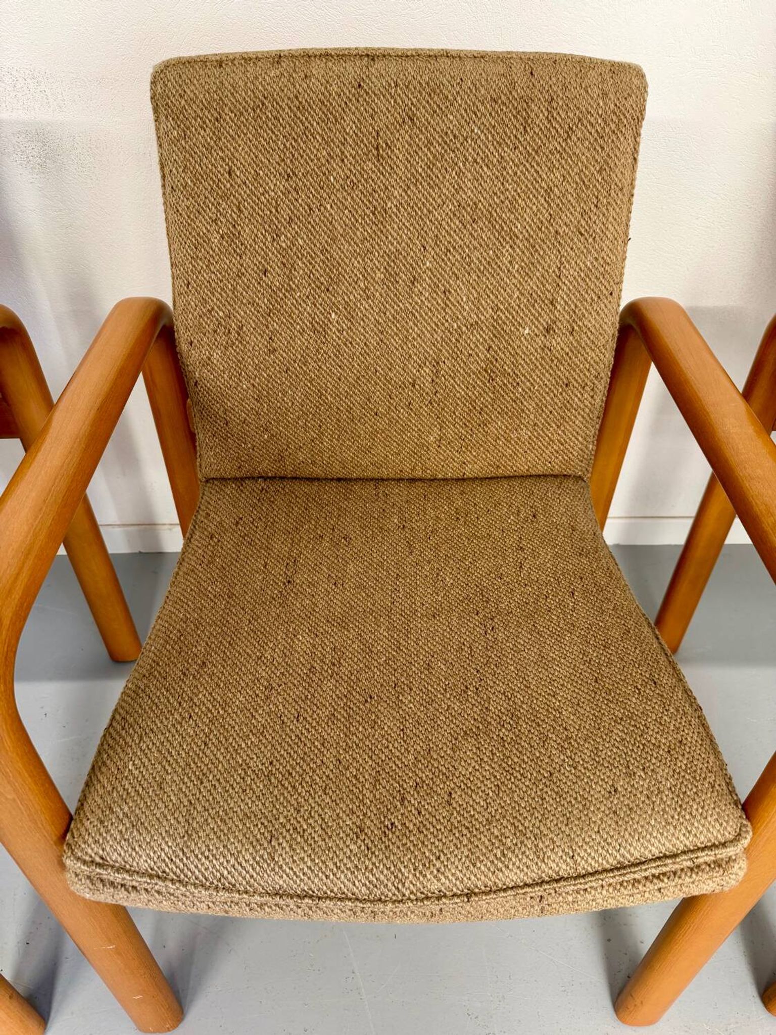 4 armchairs with armrests in beech and fabric, 1970s vintage design.