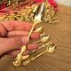 Golden metal spoons