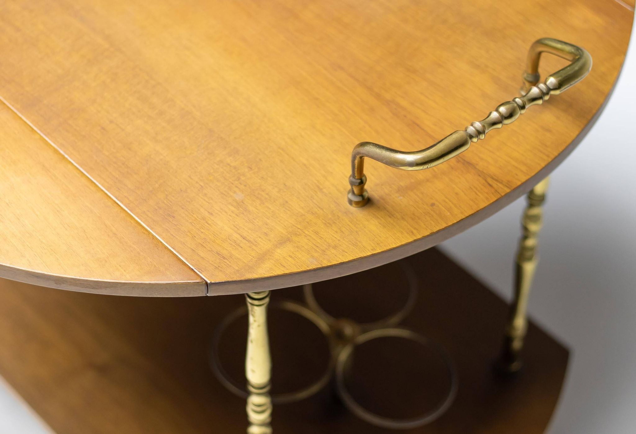 Brass and walnut bar cart by Cesare Lacca